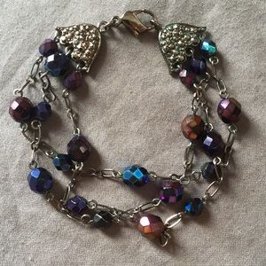 LC three-strand black, iridescent beaded bracelet (8”)